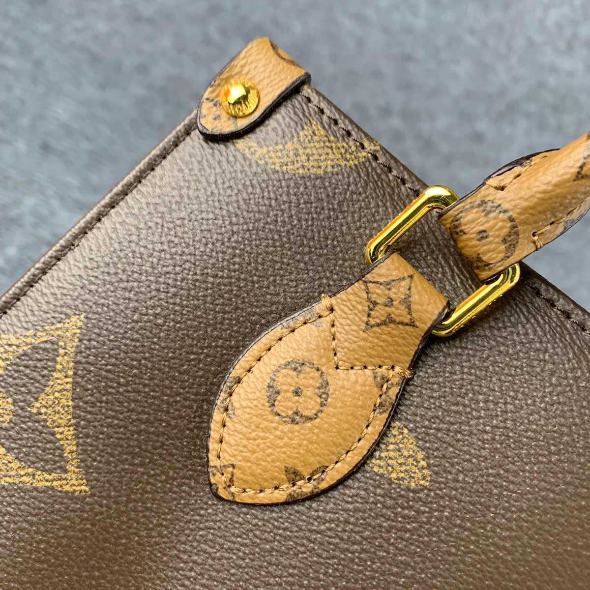 LV ONTHEGO GM  GIANT REVERSE BROWN