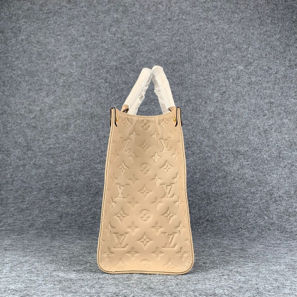 LV Onthego MM Beige Monogram Empreinte Tote Bag